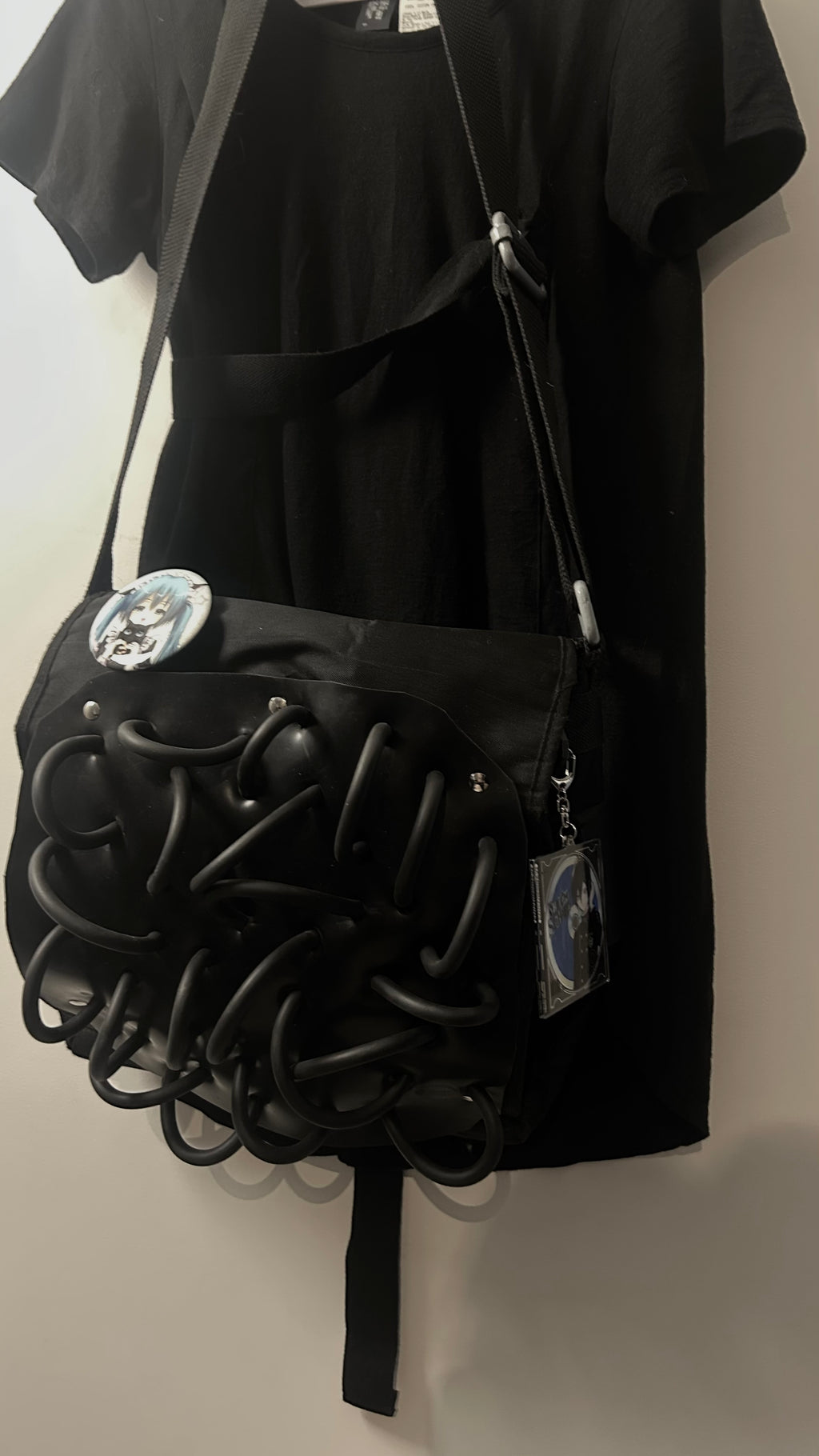 black rubber tubicol bag