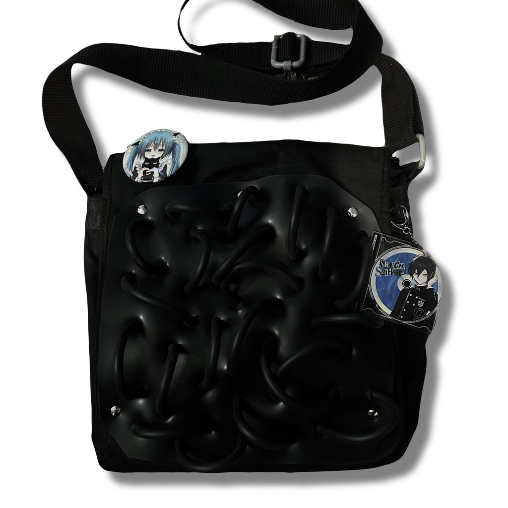 black rubber tubicol bag